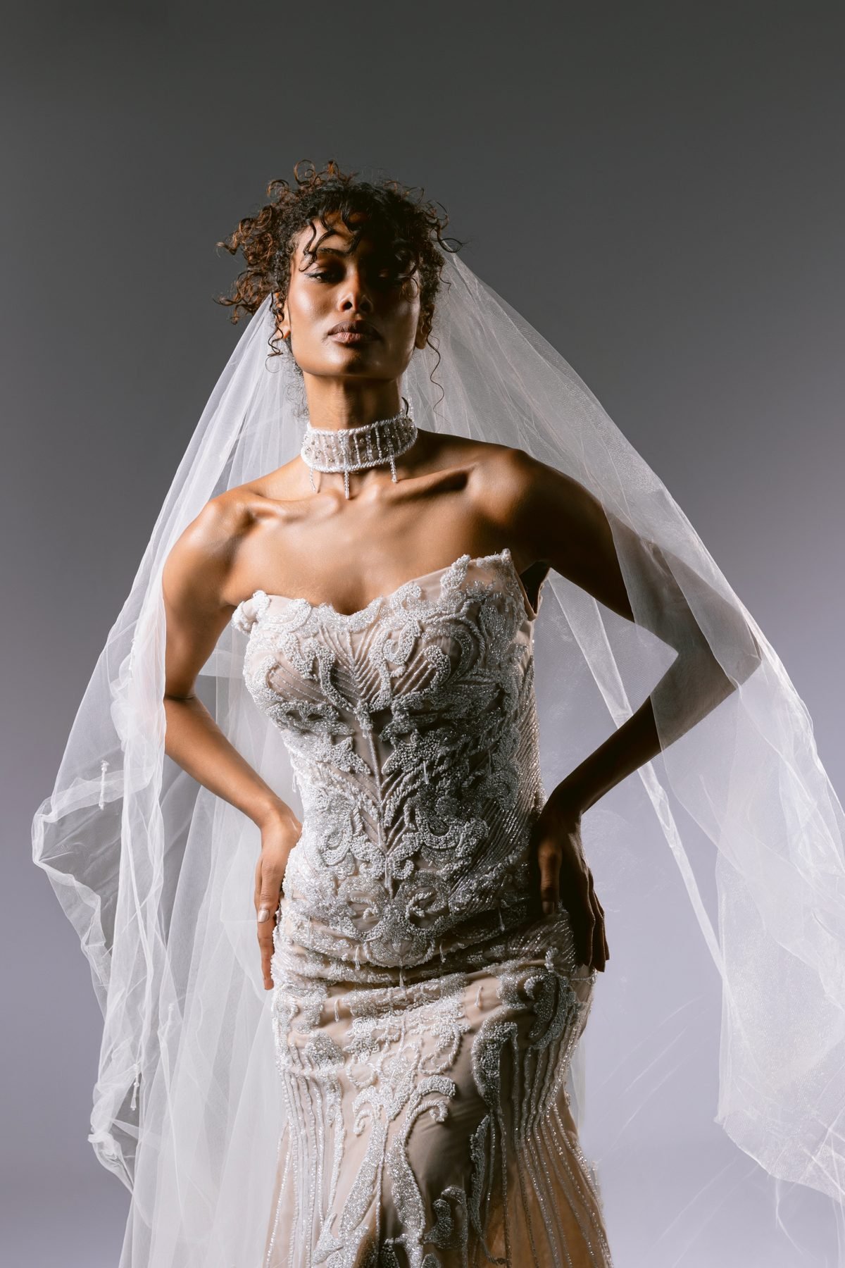 Beaded corset gown with veil and choker