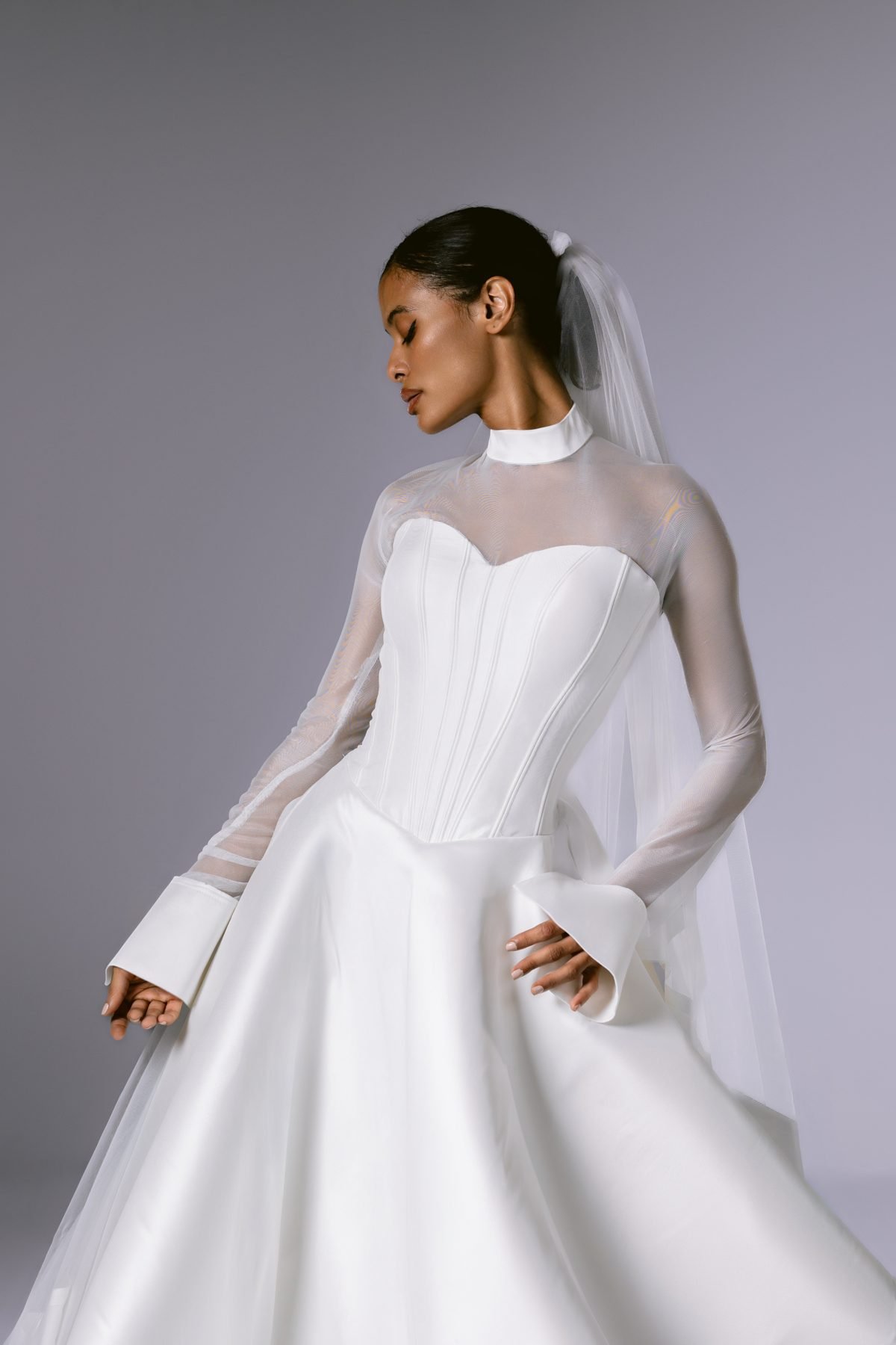 Modern silk mikado gown with sheer sleeves