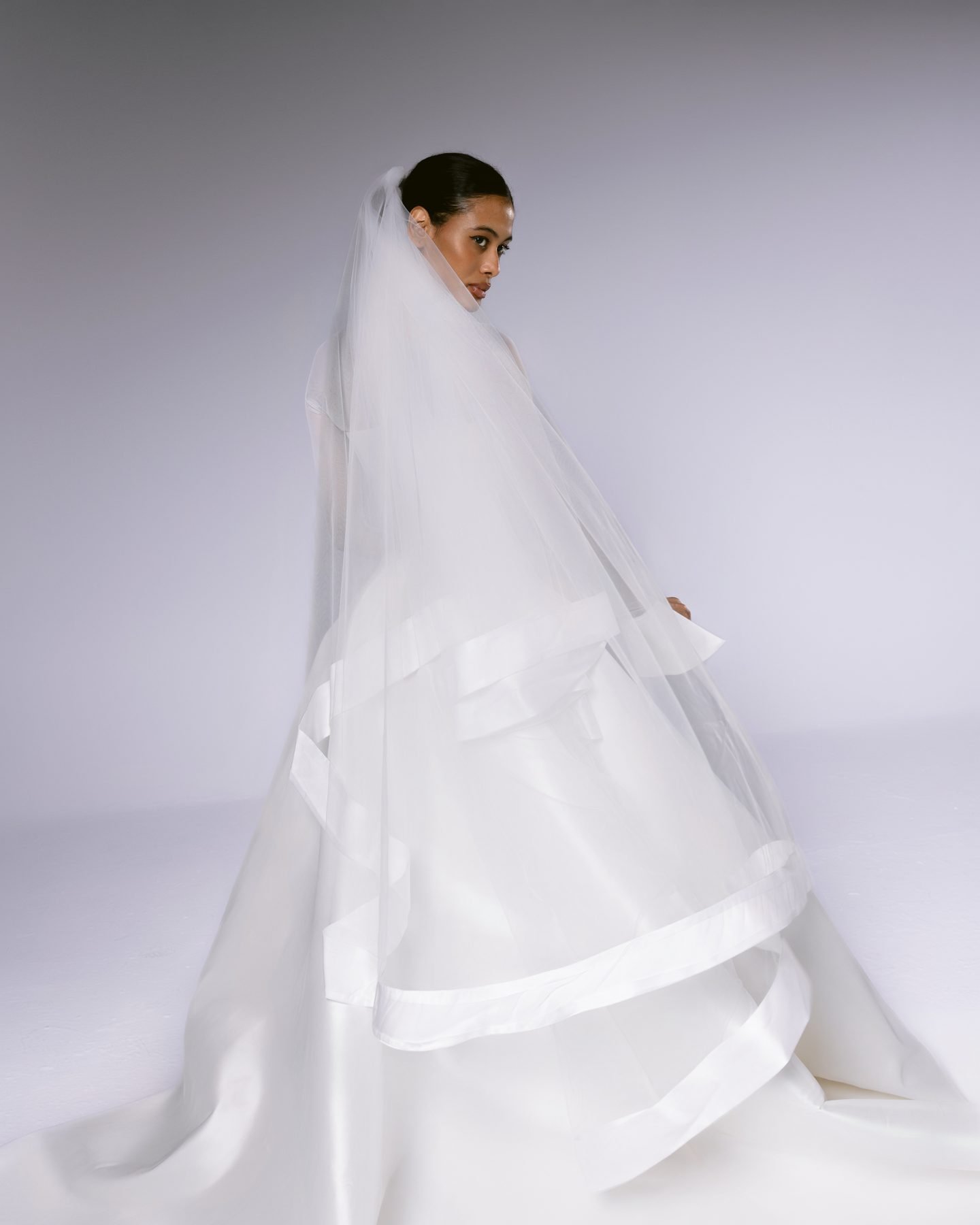 Silk gown with long veil, back view